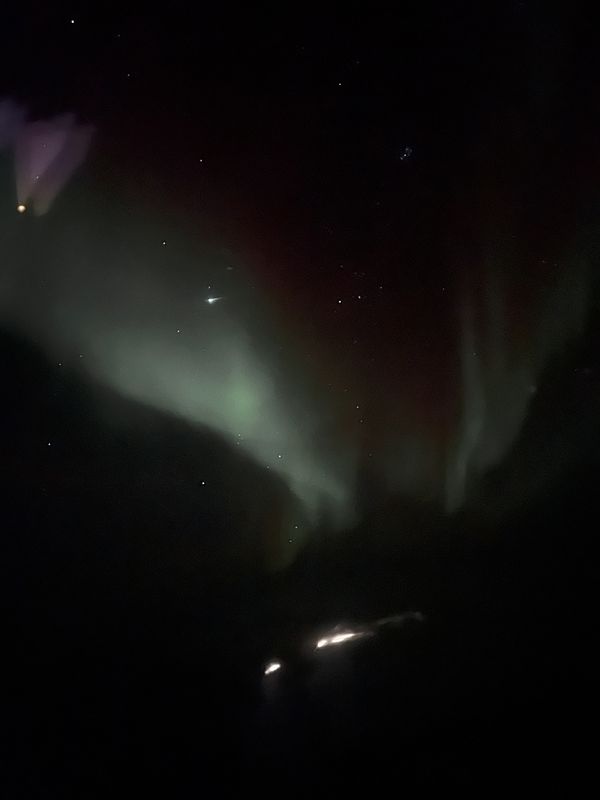 コートジボワール・Paris「コートジボワール出張1」の写真：アラスカ上空のオーロラとグリーンランド