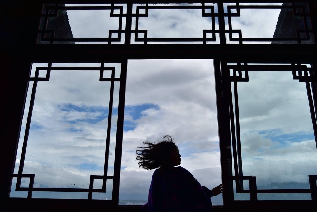 雲南省の麗江古城にて