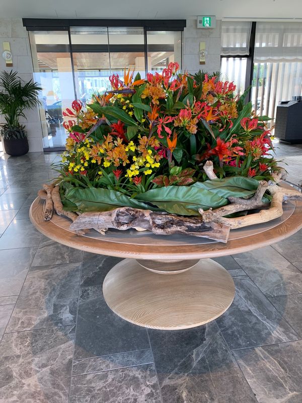 日本・沖縄県「憧れのハレクラニ　沖縄」の写真：エントランスのお花💐🌼噴水
星のリゾート...