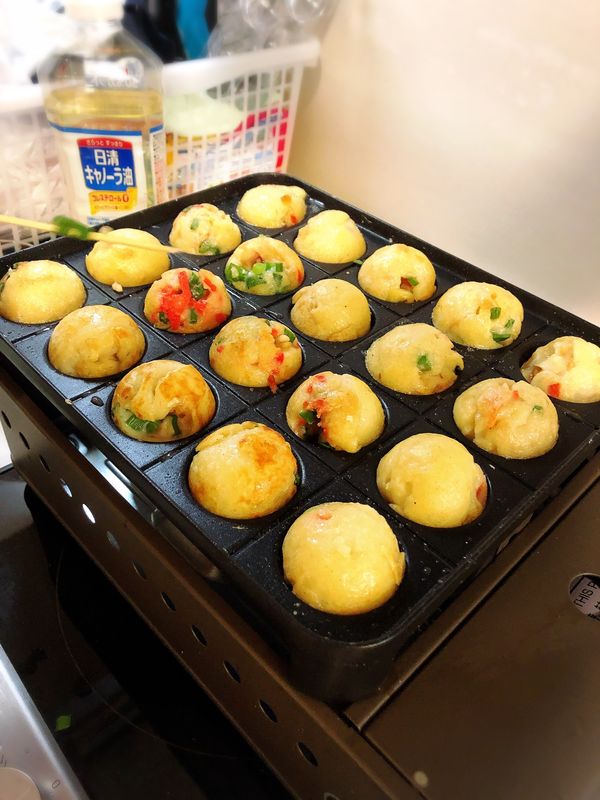 シンガポール「久しぶりの海外出張」の写真：シンガポールの駐在員とたこ焼きw
食べた...