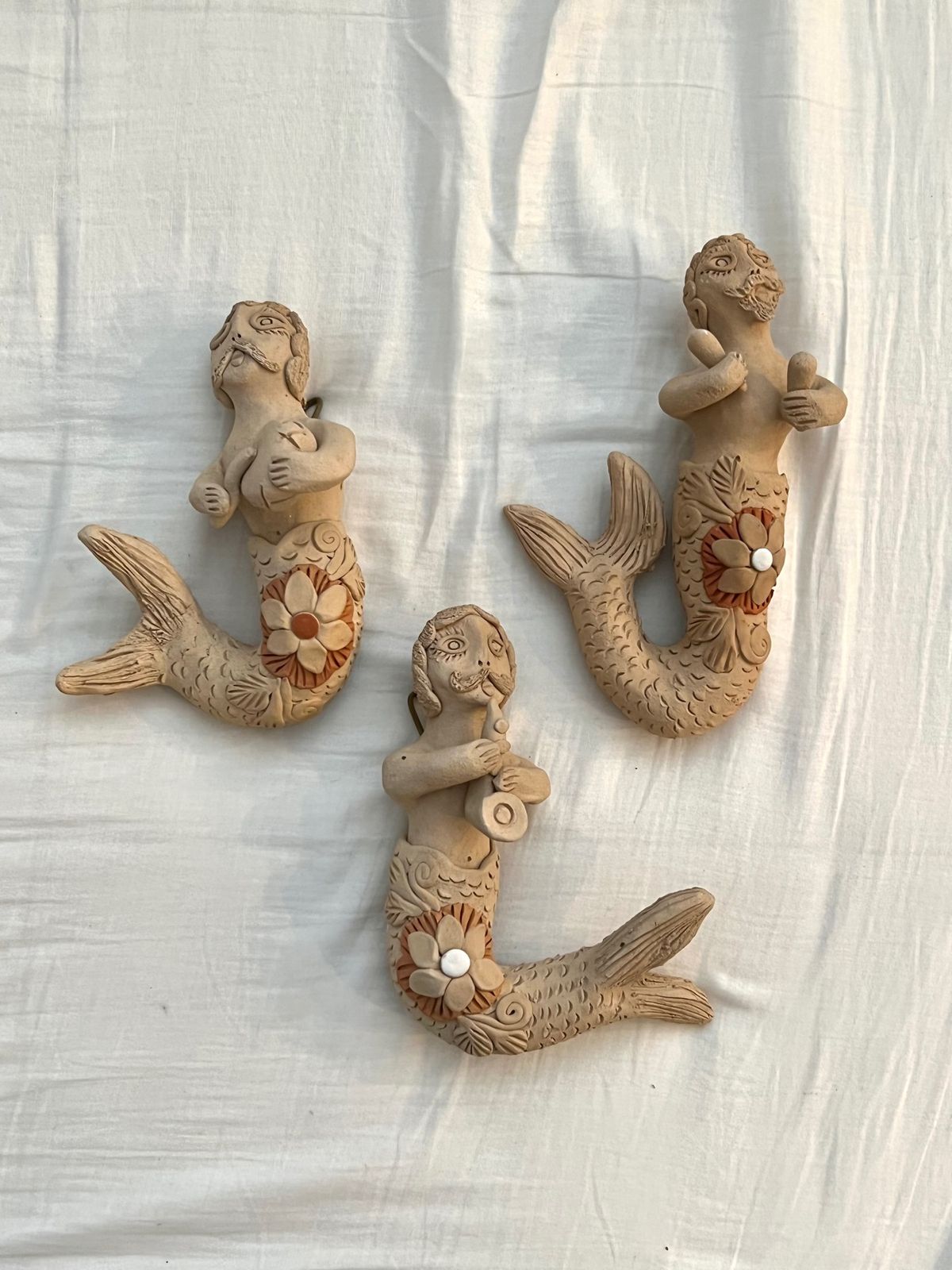 素焼きの村の工房で買った壁飾りたち

私はかなりツボだったけど
かなり好き...